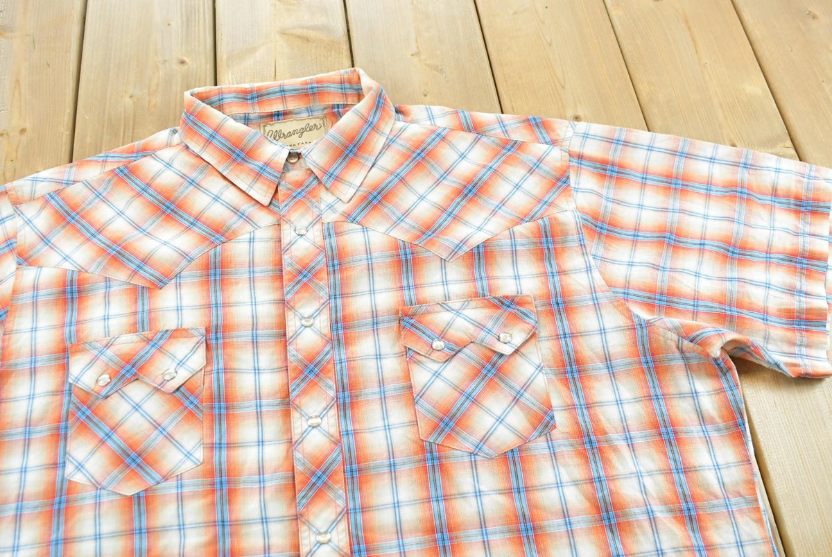 Vintage 1990s Wrangler Western Shirts Plaid Pearl Snap Short Sleeve Button Up Shirt Mens 2XL from propervintagecanada