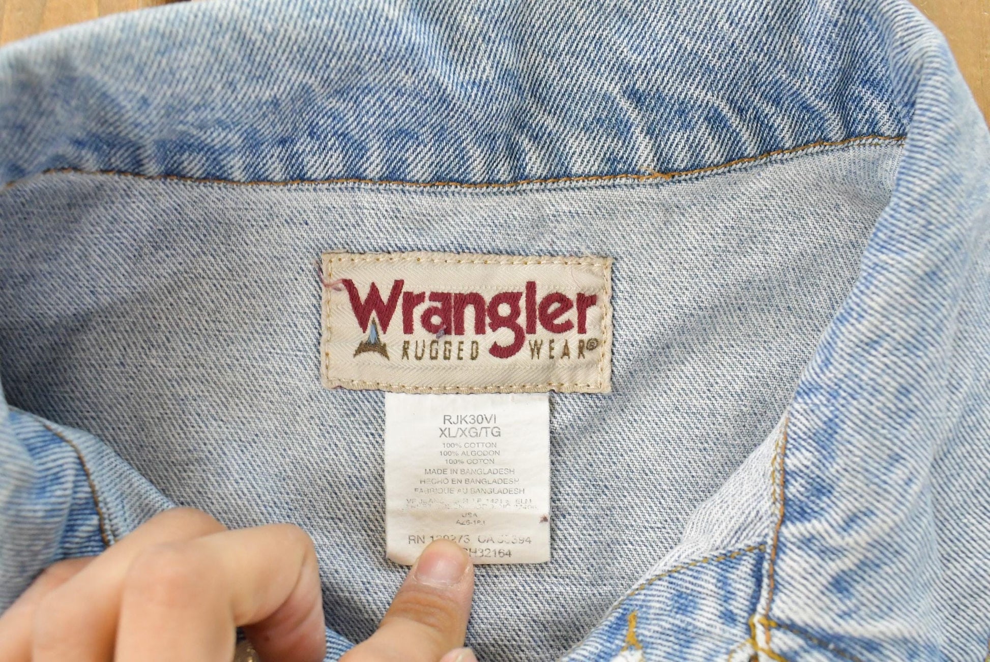 Vintage 1990s Wrangler Workwear Distressed Denim Trucker Jean Jacket Men's XL from propervintagecanada