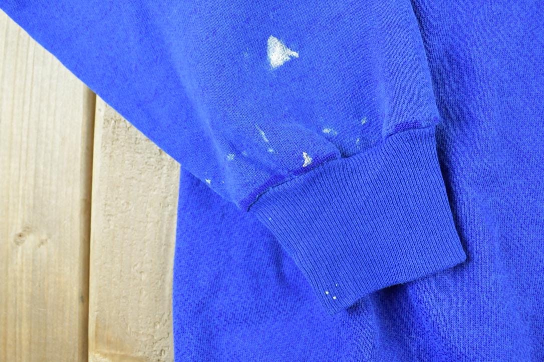 Vintage 1990s Xavier University Crewneck Men's Large from propervintagecanada