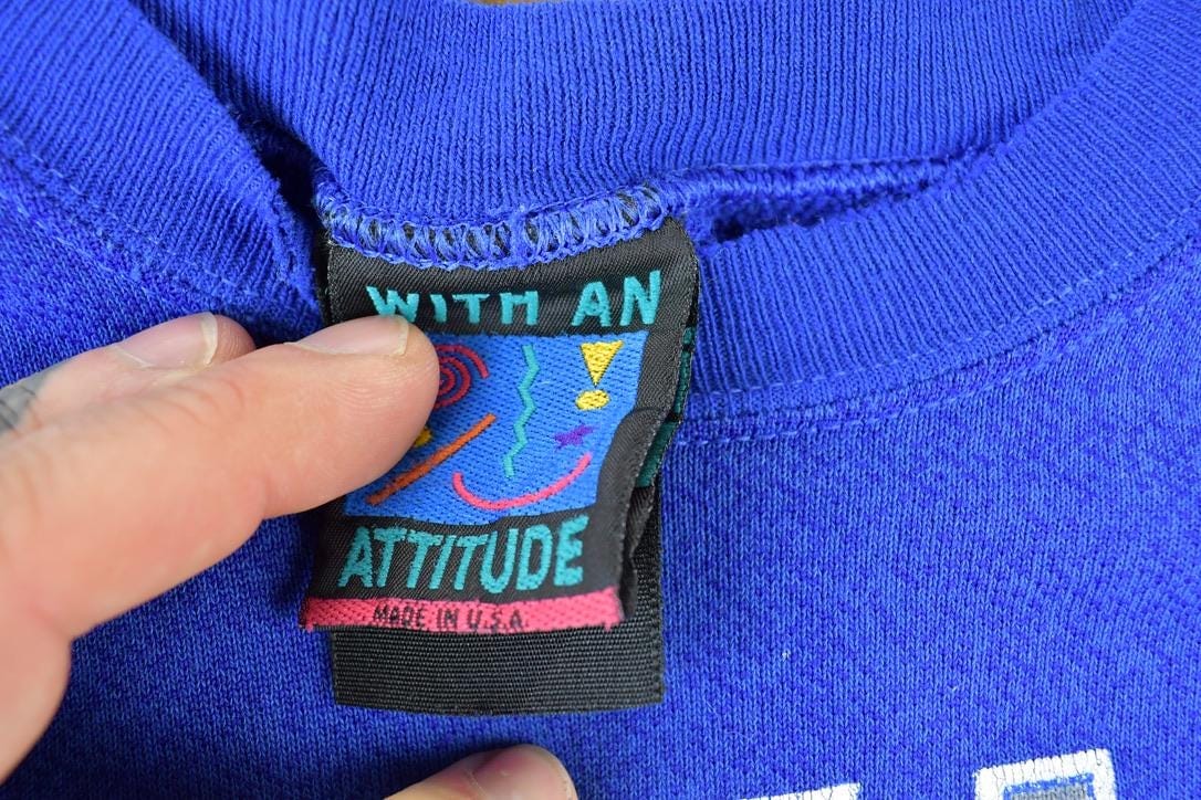 Vintage 1990s Xavier University Crewneck Men's Large from propervintagecanada