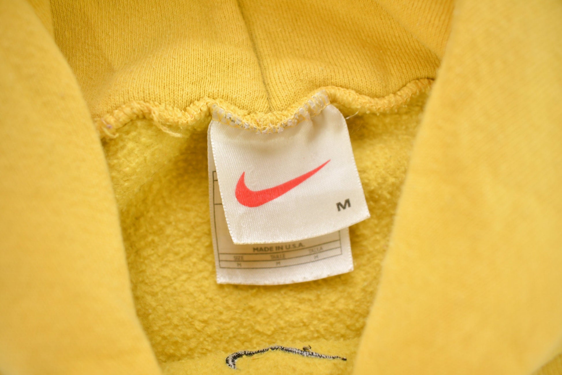 Vintage 1990s Yellow Nike Center Swoosh Hoodie from propervintagecanada