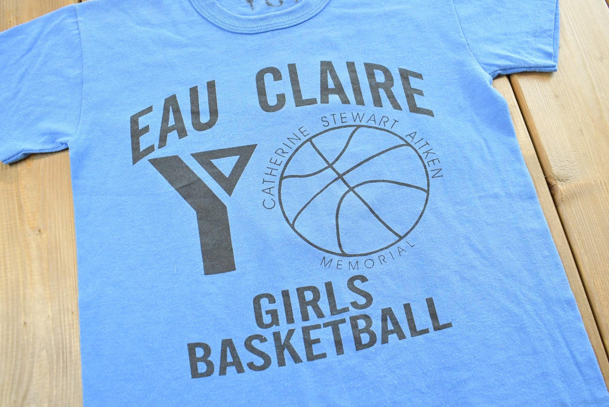 Vintage 1990s Youth Russell Athletic Eau Clair YMCA Girls Basketball T-Shirt Youth L from propervintagecanada