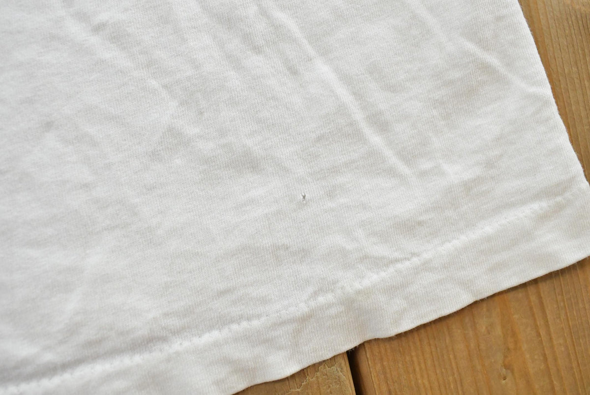 Vintage 1990s Yukon Jack Perma Frost Schnapps Graphic T-Shirt Mens XL from propervintagecanada