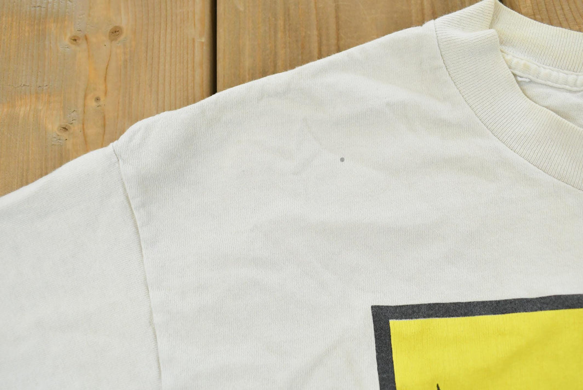 Vintage 1991 Acme Clothing Tweet Bird Warner Bros T-Shirt Men's L from propervintagecanada