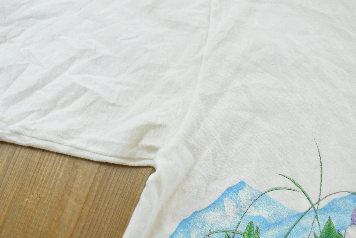 Vintage 1991 Habitat Durango Butterfly Garden Wraparound Graphic T-Shirt Men's M from propervintagecanada