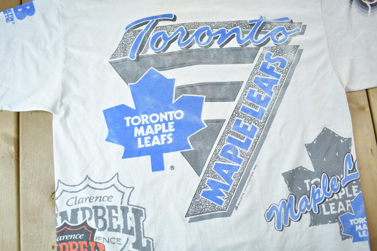 Vintage 1991 Toronto Maple Leafs NHL All Over Print Graphic T-Shirt Men's XL from propervintagecanada
