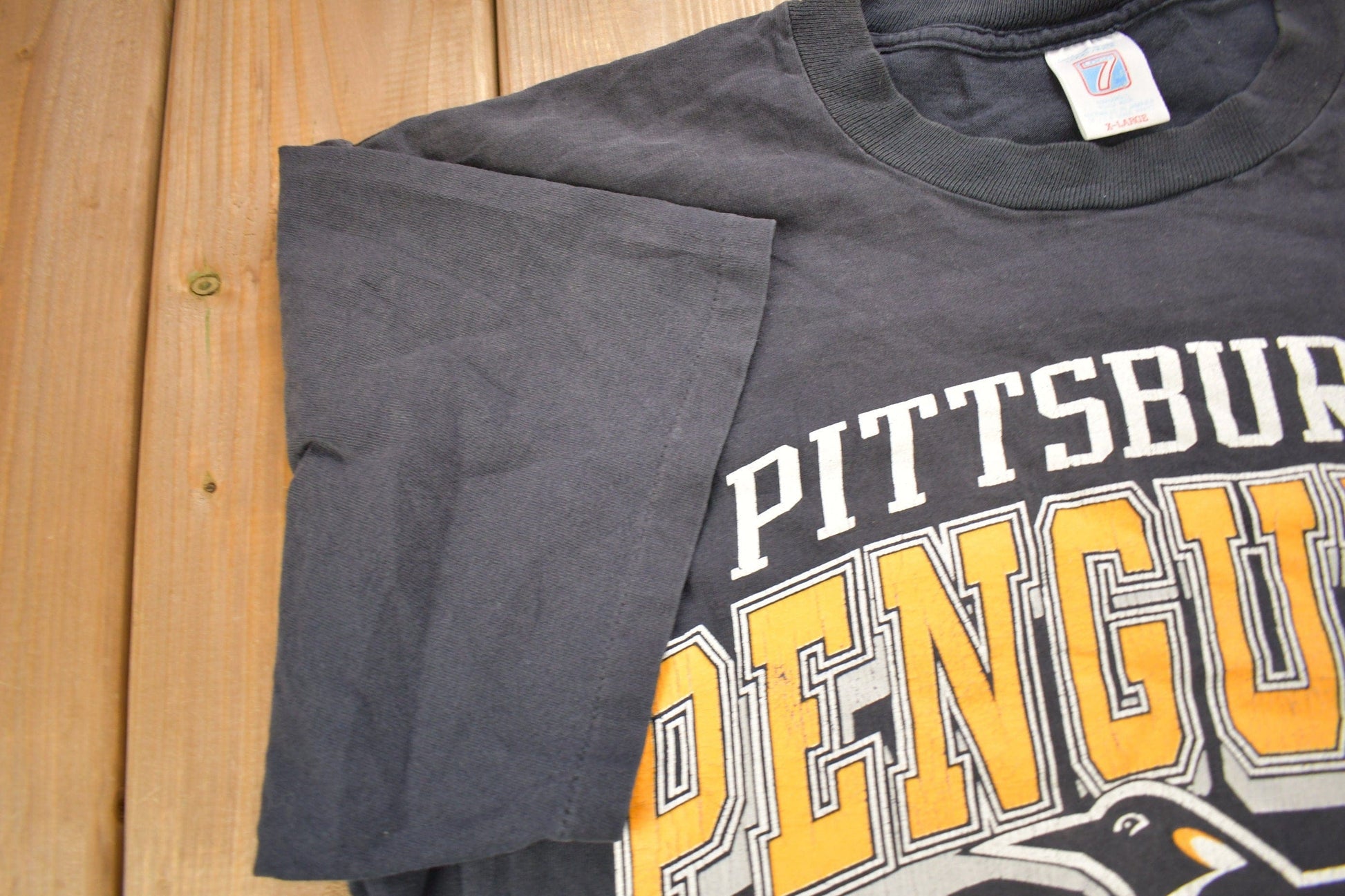 Vintage 1992 Pittsburgh Penguins NHL Graphic Logo 7 T-Shirt Men's XL from propervintagecanada
