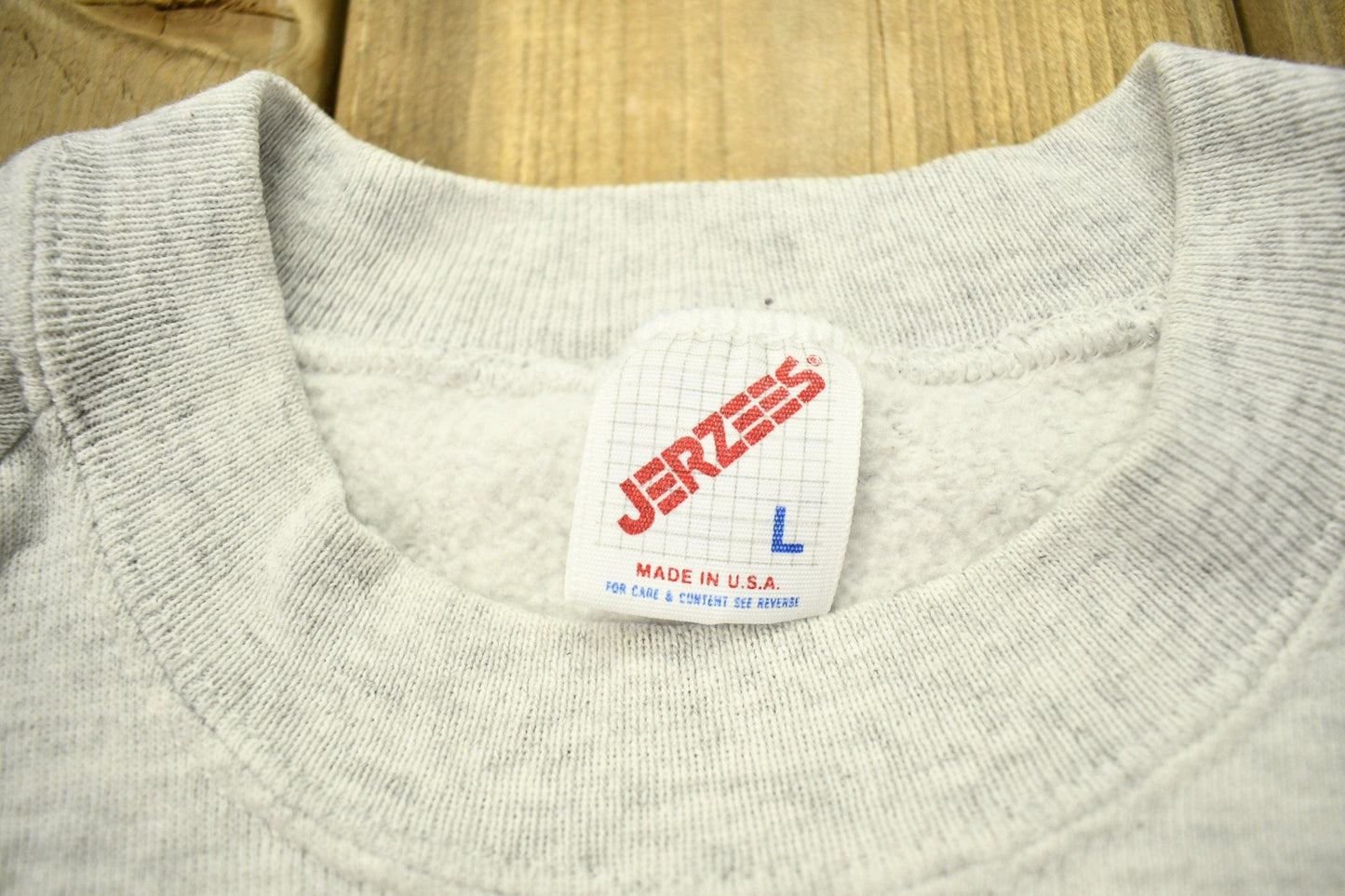 Vintage 1993 Looney Tunes North Pole Christmas Theme Raglan Crewneck Men's Medium from propervintagecanada
