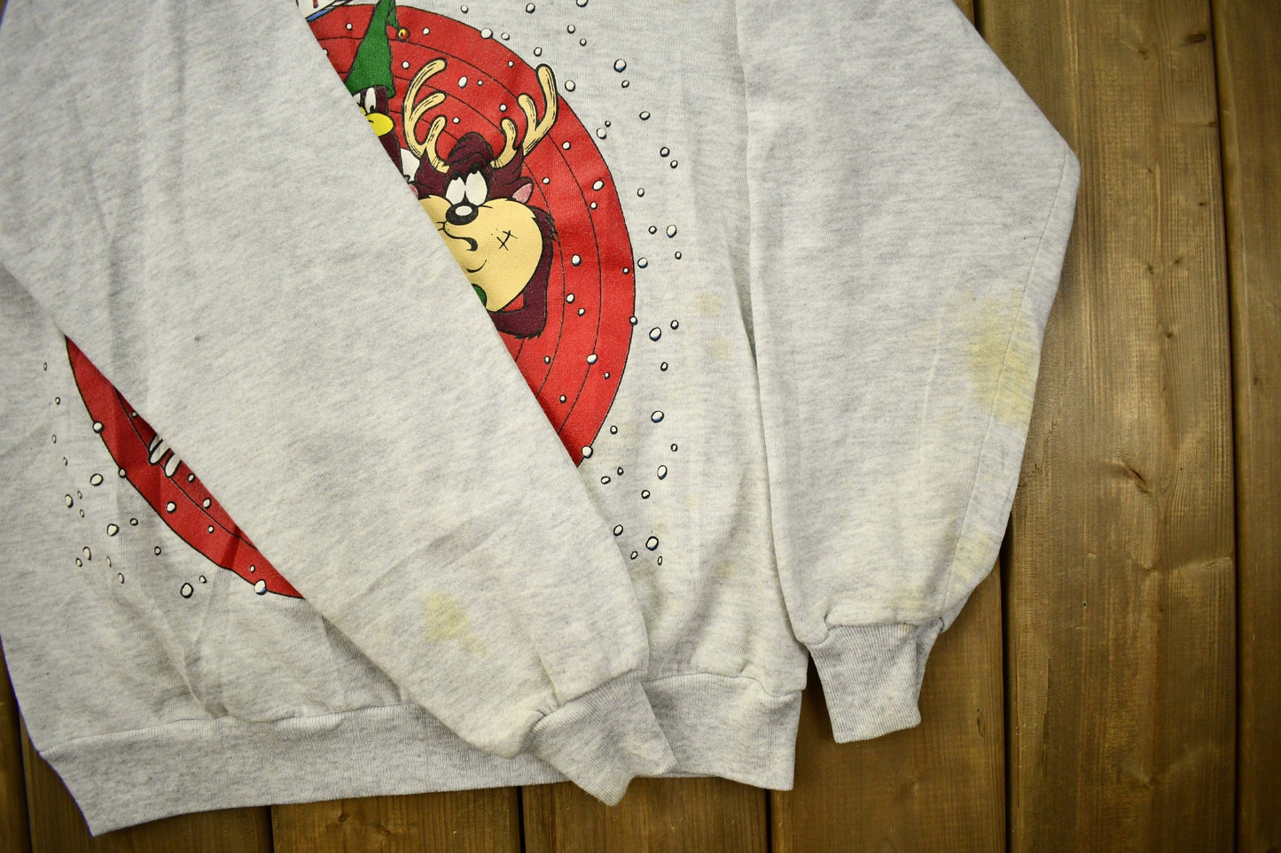 Vintage 1993 Looney Tunes North Pole Christmas Theme Raglan Crewneck Men's Medium from propervintagecanada