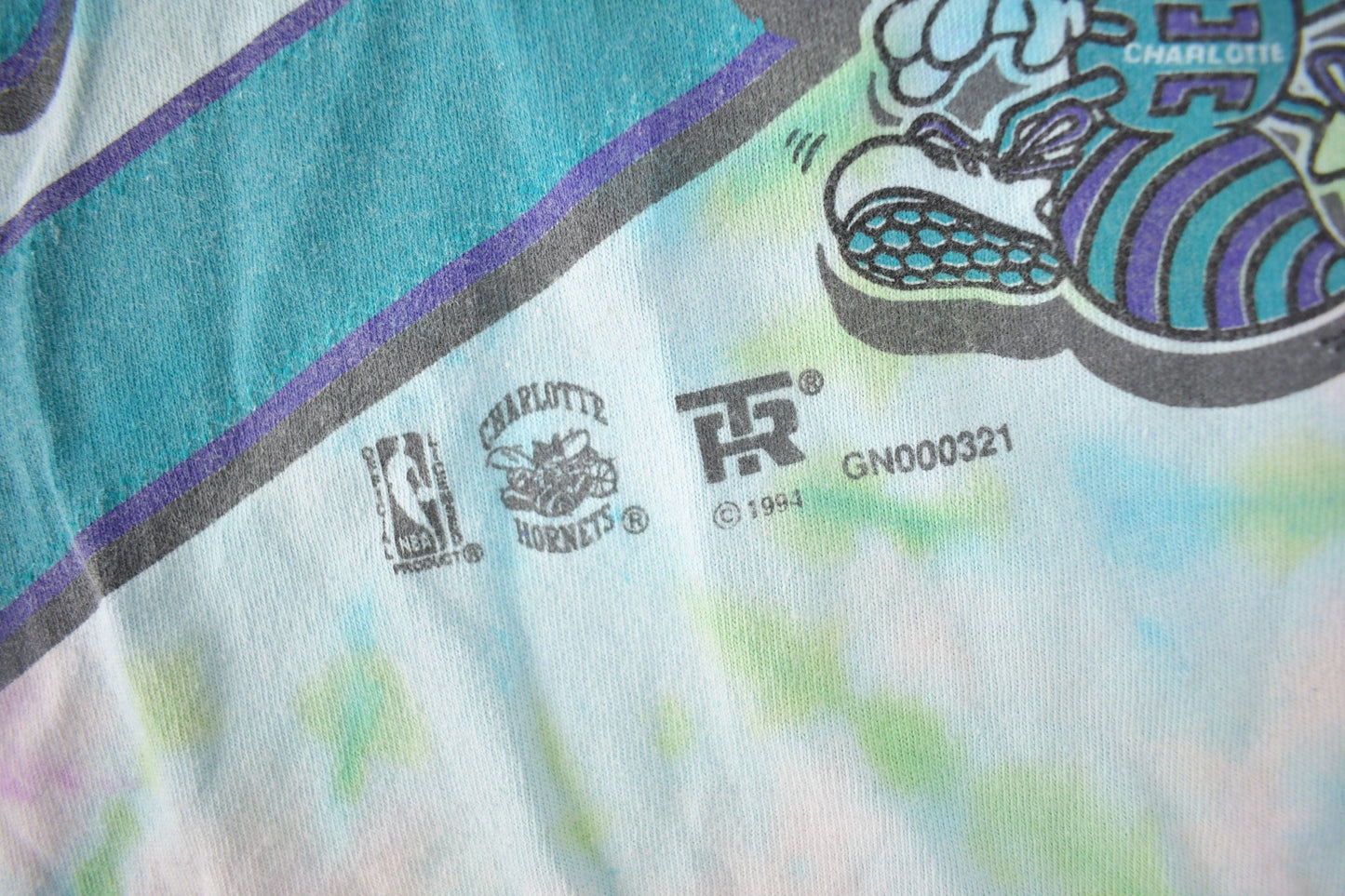 Vintage 1994 Charlotte Hornets NBA Basketball Tie Dye Graphic T-Shirt Made In USA from propervintagecanada