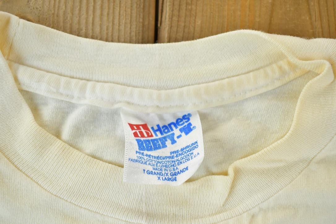 Vintage 1994 NASFT New York Fancy Food Show Souvenir Single Stitch Graphic Print T-Shirt Men's XL from propervintagecanada