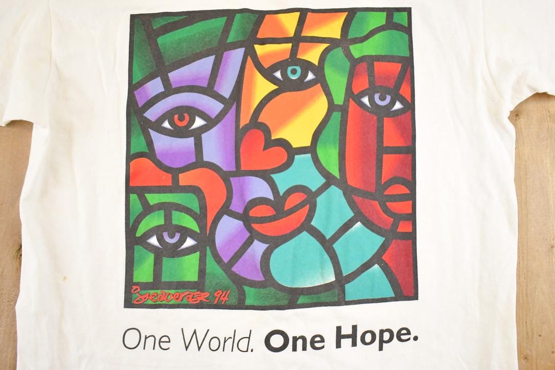 Vintage 1994 One World One Hope Art T-Shirt Men's L from propervintagecanada
