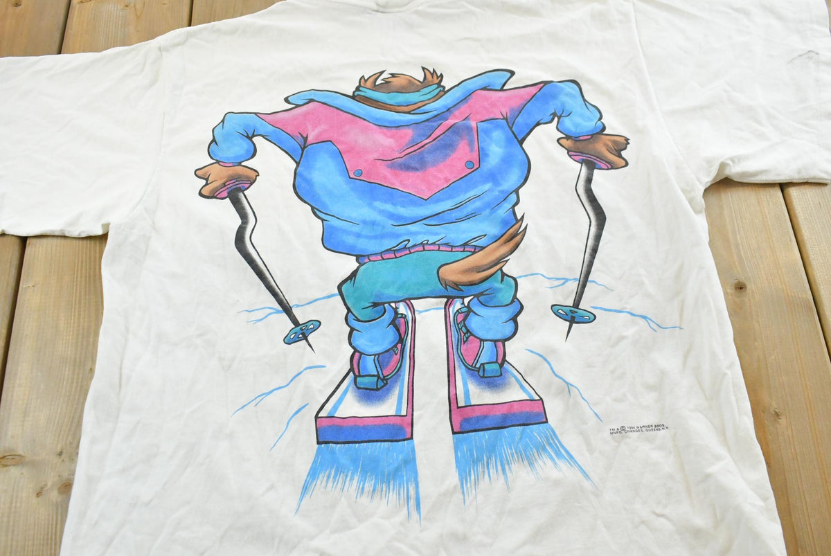 Vintage 1994 Taz Ski Looney Tunes Cartoon Graphic T-Shirt Mens L from propervintagecanada
