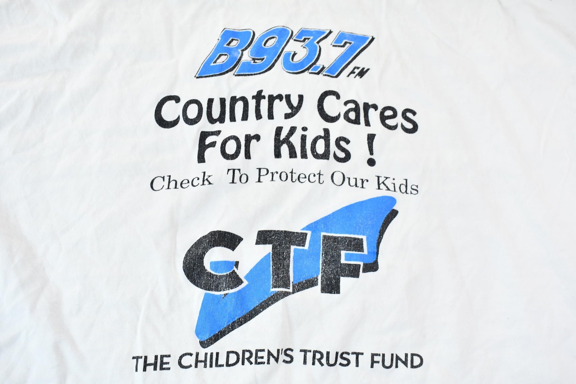 Vintage 1995 Greenville South Carolina B93.7 Children's Trust Fund Single Stitch Graphic T-Shirt Men's Large from propervintagecanada