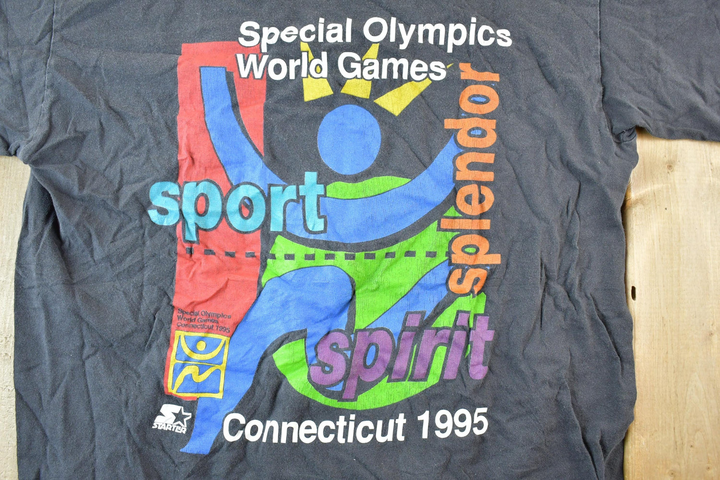 Vintage 1995 Starter Special Olympics World Games Souvenir Single Stitch Graphic Print T-Shirt Men's Large from propervintagecanada