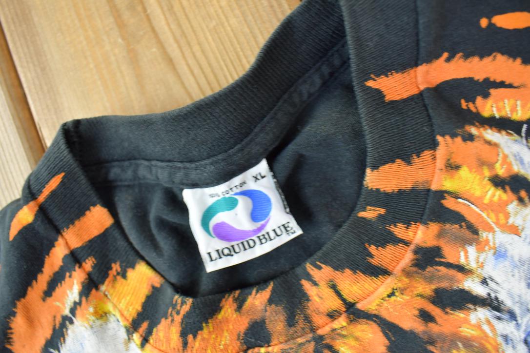 Vintage 1995 Tiger Theme All Over Print Liquid Blue Double Sided Graphic T-Shirt from propervintagecanada