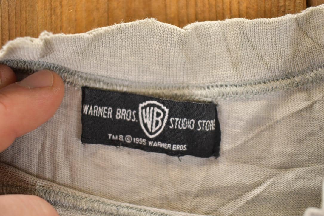 Vintage 1995 Warner Bros Marvin The Invader Embroidered 3D Movie Taz Bugs Crewneck Sweatshirt Men's L from propervintagecanada