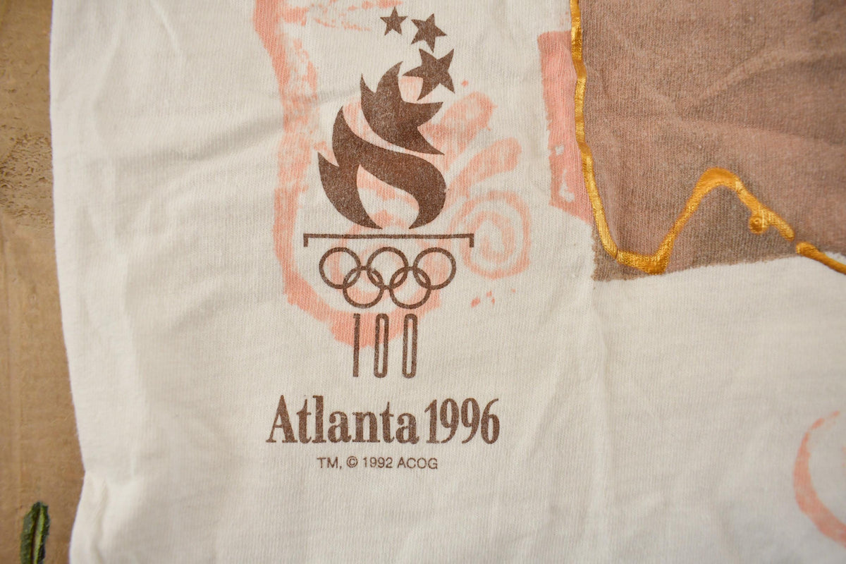 Vintage 1996 Atlanta Centennial Olympic Games Graphic Souvenir Single Stitch T-Shirt Men's XL from propervintagecanada