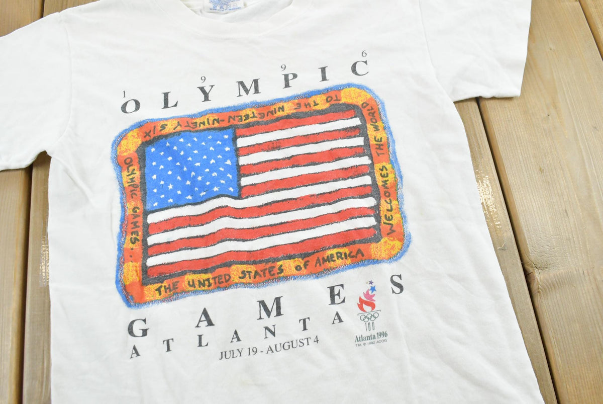 Vintage 1996 Atlanta Olympic Games American Flag Souvenir T-Shirt Men's XS from propervintagecanada