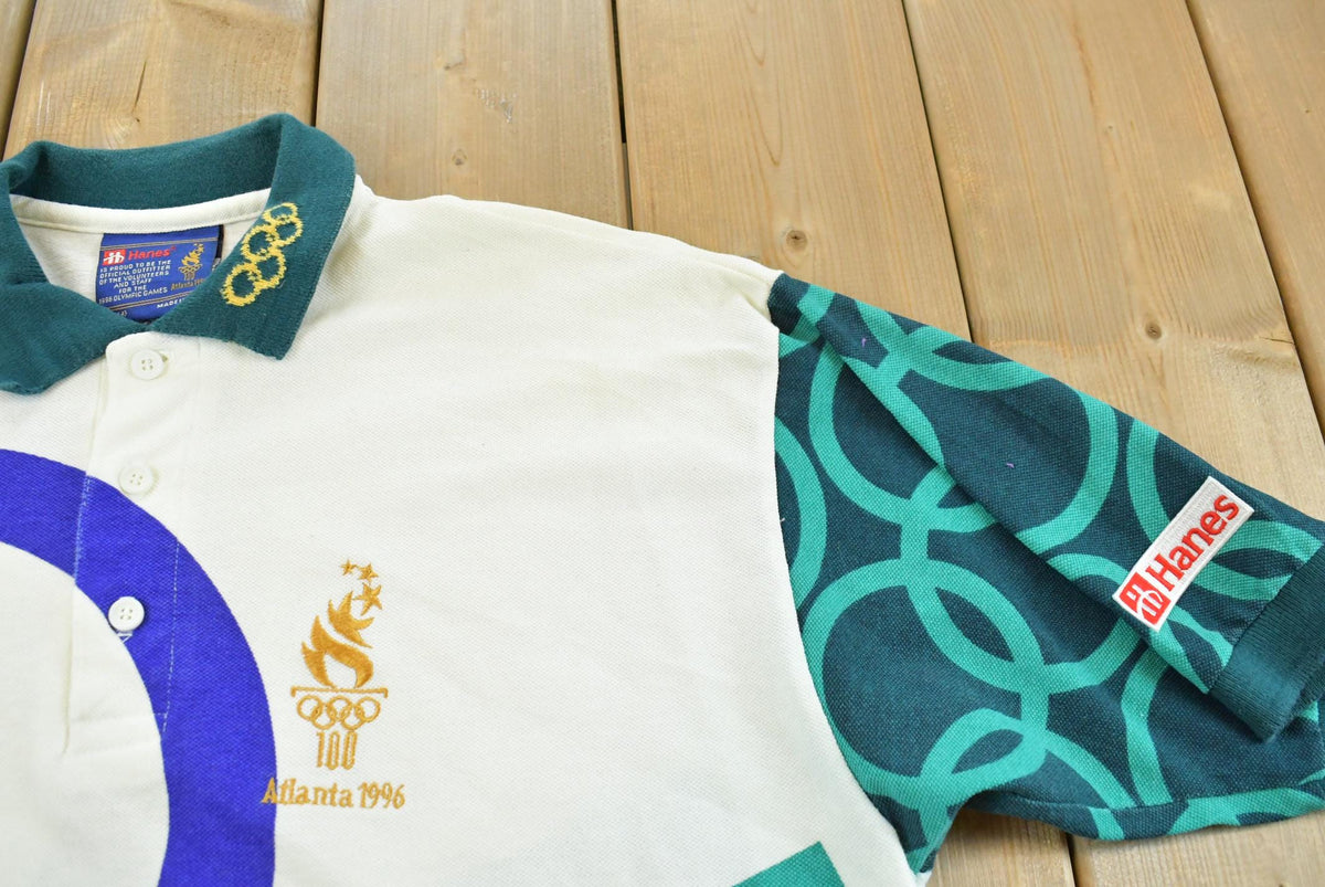 Vintage 1996 Hanes Atlanta Olympics AOP American Flag Button Up Polo Collared Shirt Mens L from propervintagecanada