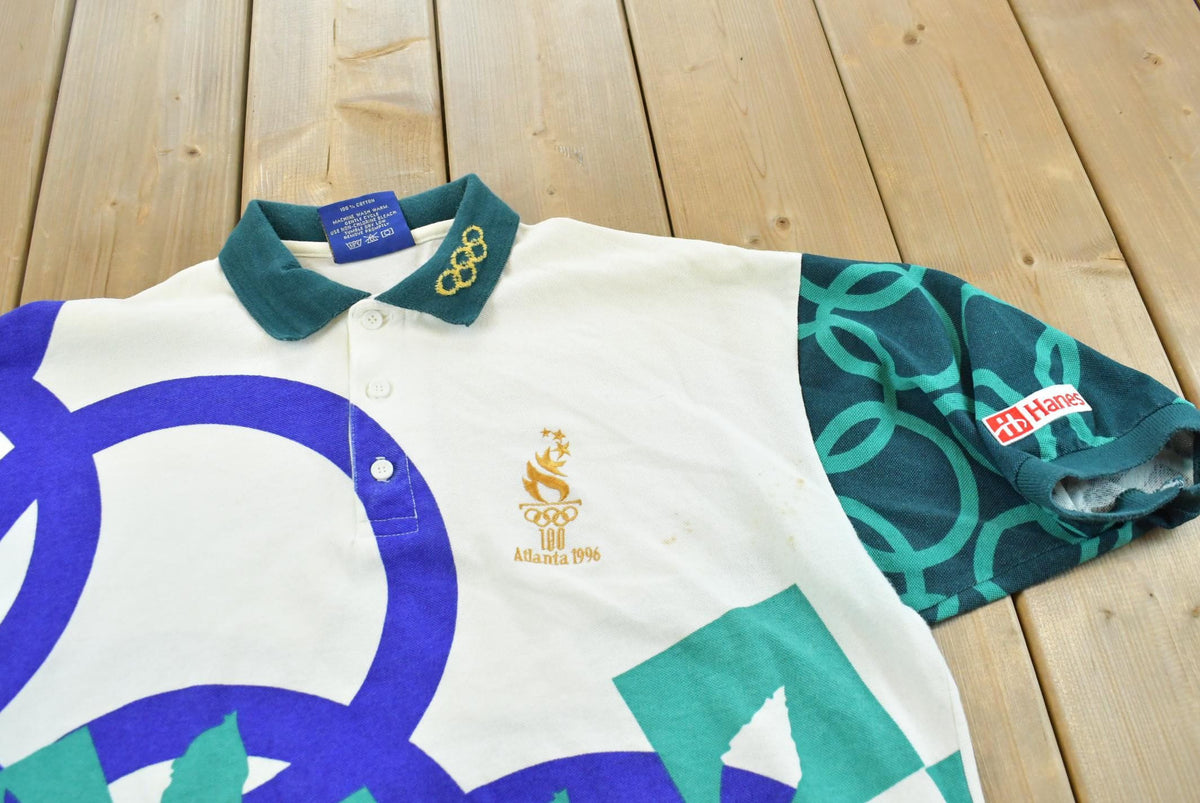 Vintage 1996 Hanes Atlanta Olympics AOP American Flag Button Up Polo Collared Shirt Mens L from propervintagecanada