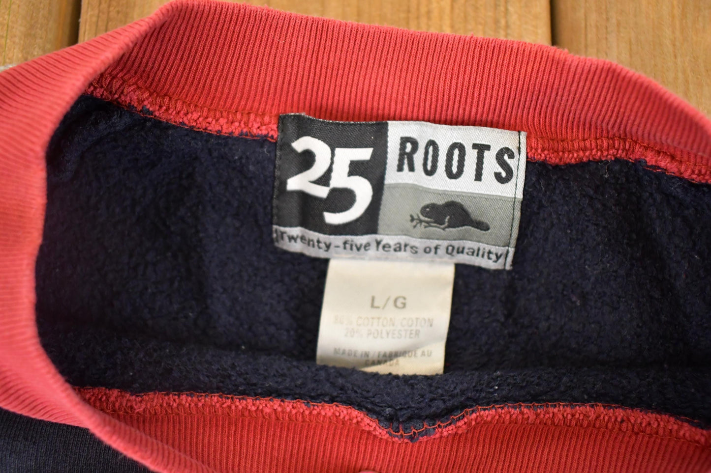 Vintage 1998 Roots Athletics Souvenir Crewneck Sweatshirt Men's XL from propervintagecanada