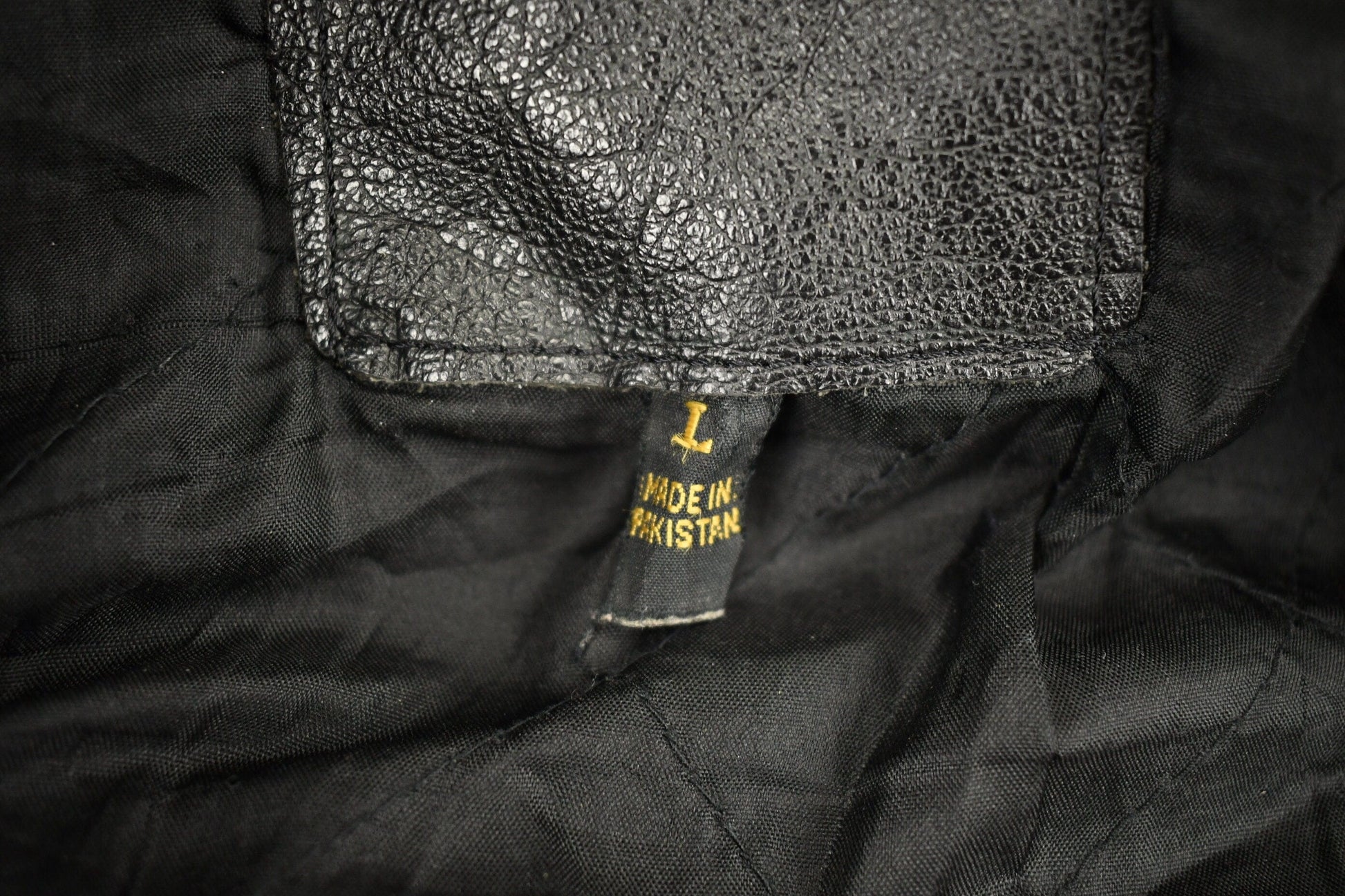 Vintage 1998s Fringed Leather Motorcycle Jacket Men's Large from propervintagecanada