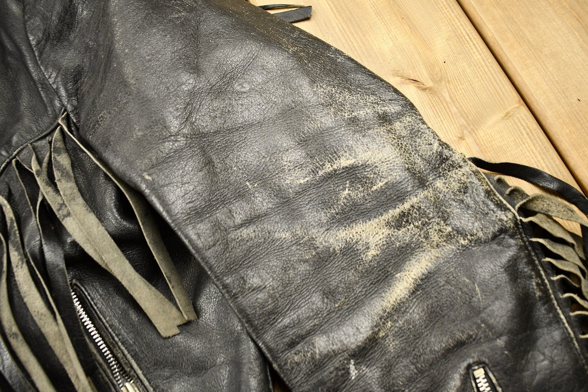 Vintage 1998s Fringed Leather Motorcycle Jacket Men's Large from propervintagecanada