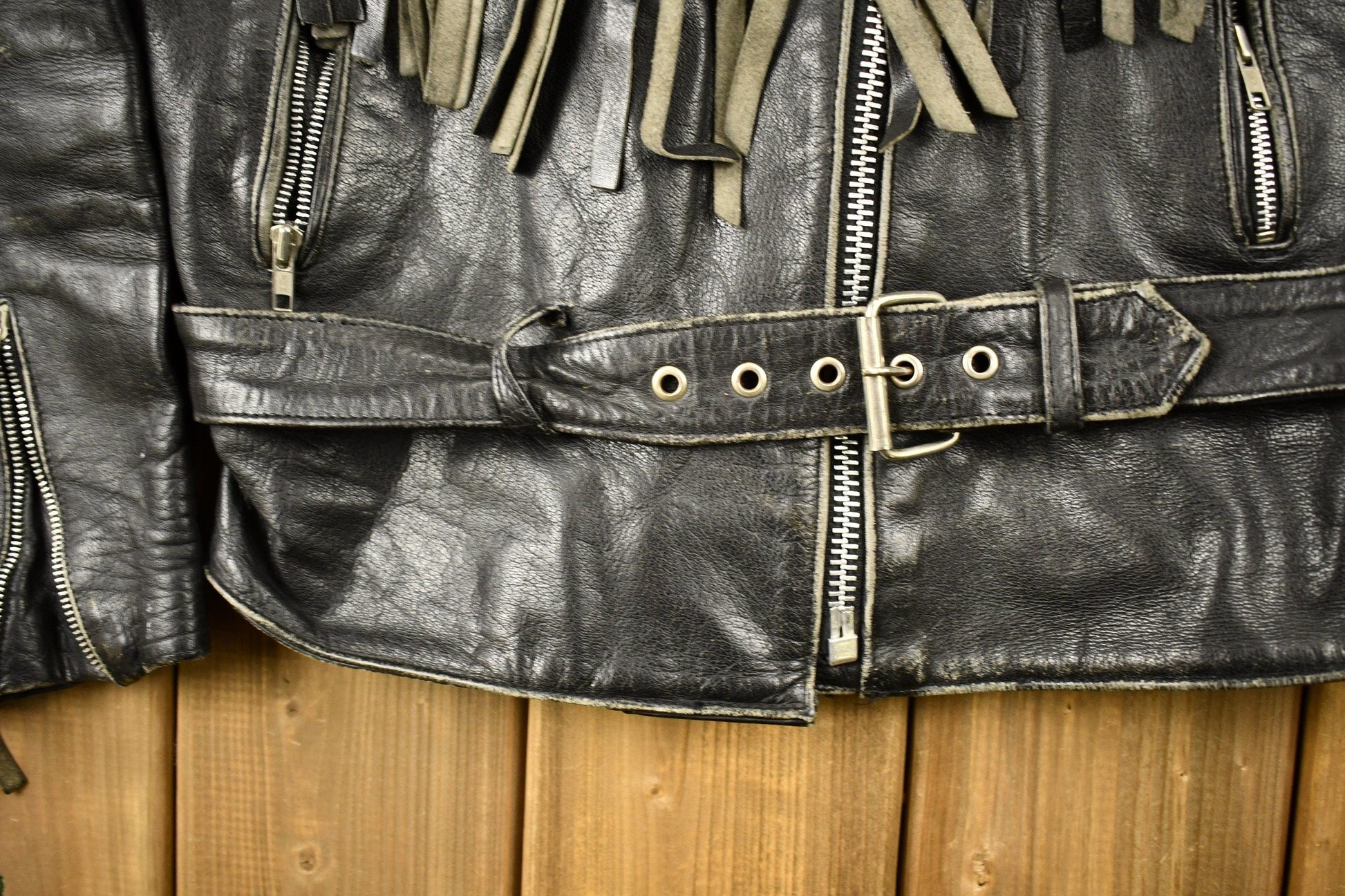 Vintage 1998s Fringed Leather Motorcycle Jacket Men's Large from propervintagecanada