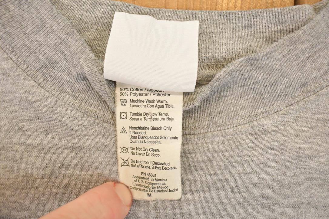 Vintage 1999 Minnesota Vikings Purple People Eaters NFL Crewneck Sweatshirt Mens M from propervintagecanada