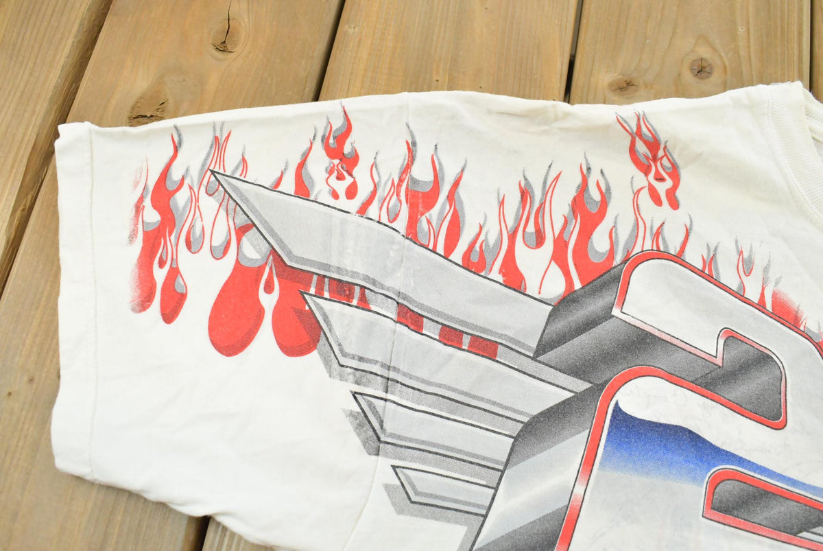 Vintage 1999 Rusty Wallace Harley Davidson All Over Print Flames NASCAR Racing T-Shirt Mens L from propervintagecanada