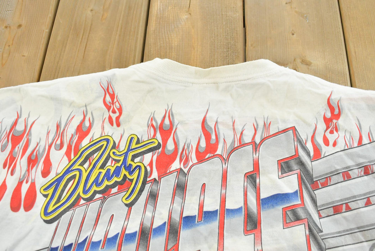 Vintage 1999 Rusty Wallace Harley Davidson All Over Print Flames NASCAR Racing T-Shirt Mens L from propervintagecanada