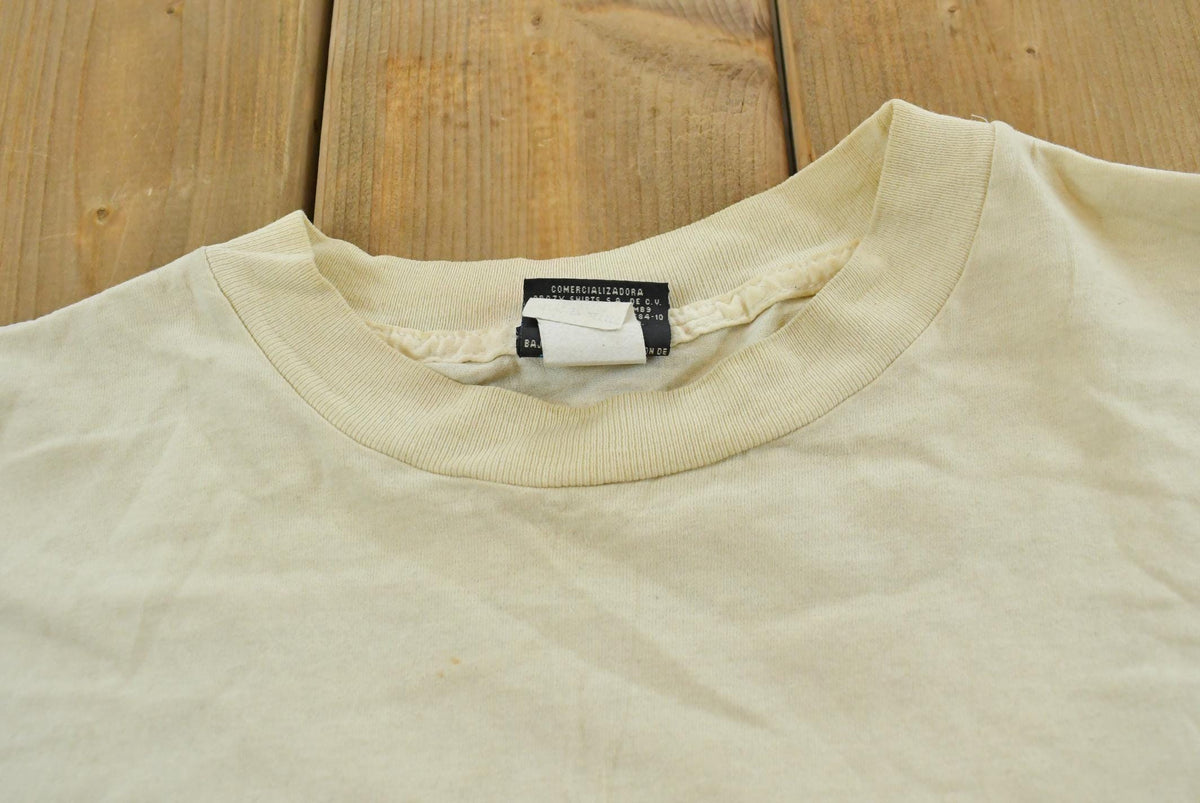 Vintage 2000 Squalo Mayan Art Surfing T-Shirt Men's XL from propervintagecanada