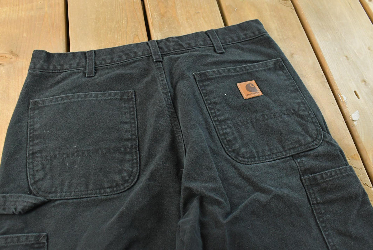 Vintage 2000s Carhartt Black Canvas Pants Men's 31 x 30 from propervintagecanada