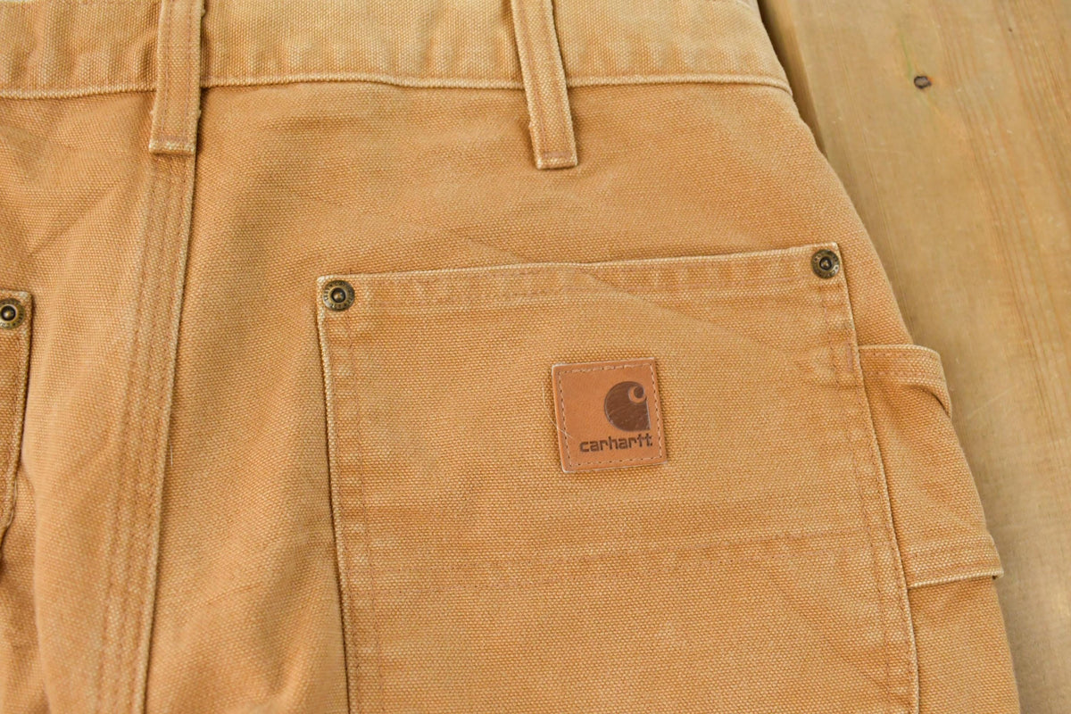 Vintage 2000s Carhartt Bushwhacker Double Knee Canvas Pants Men's 32 x 32 from propervintagecanada