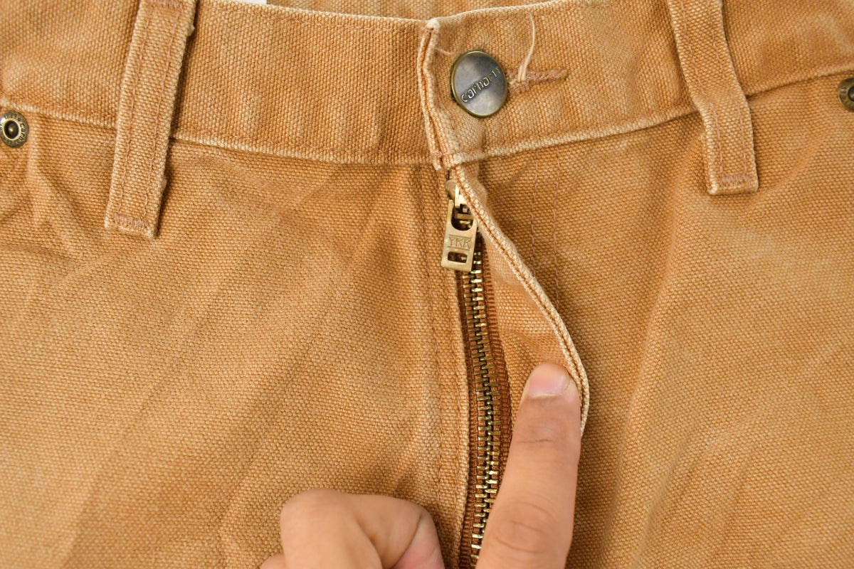 Vintage 2000s Carhartt Bushwhacker Double Knee Canvas Pants Men's 32 x 32 from propervintagecanada
