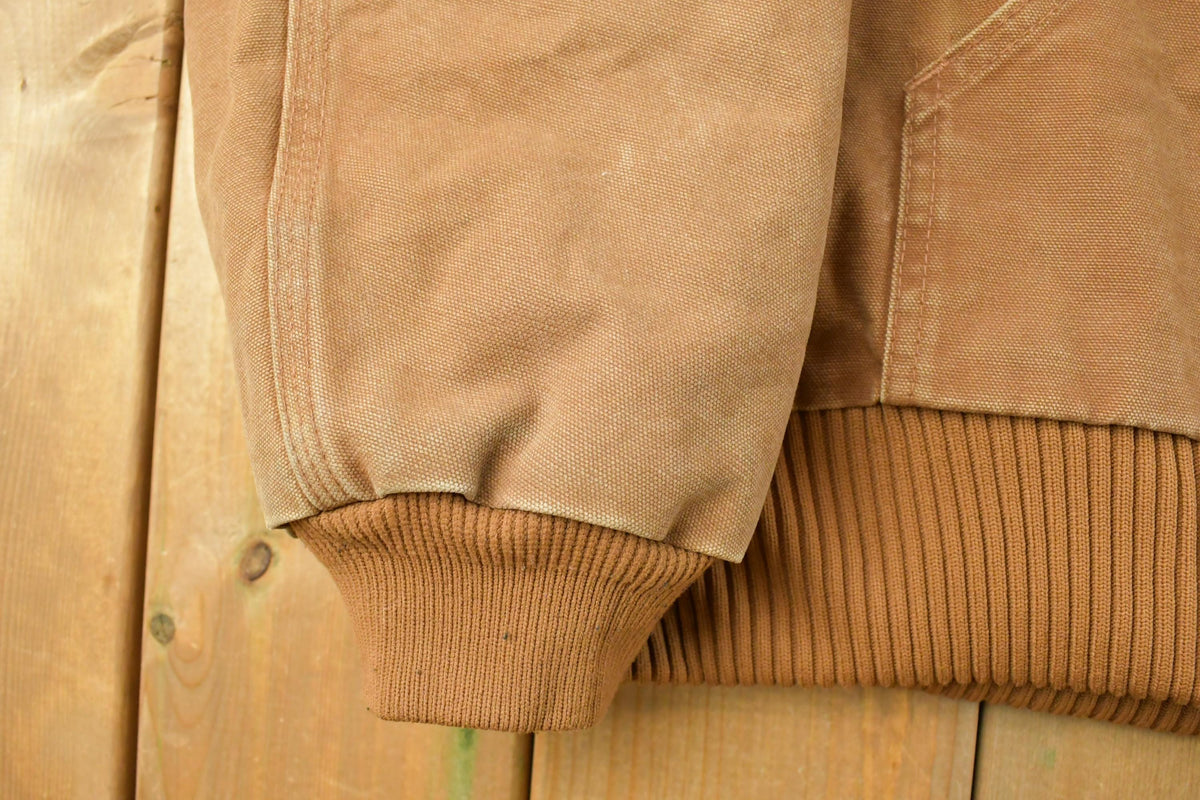 Vintage 2000s Carhartt Canvas Hooded Jacket Men's 2XL from propervintagecanada