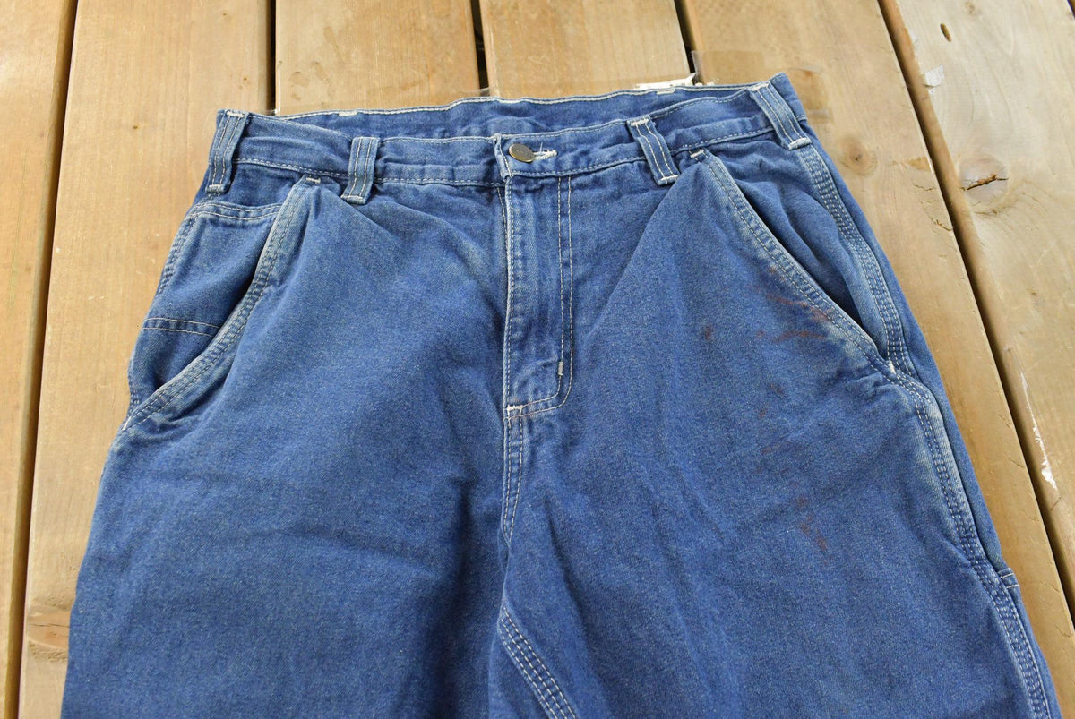 Vintage 2000s Carhartt Denim Blue Jeans Men's 28 x 28.5 from propervintagecanada