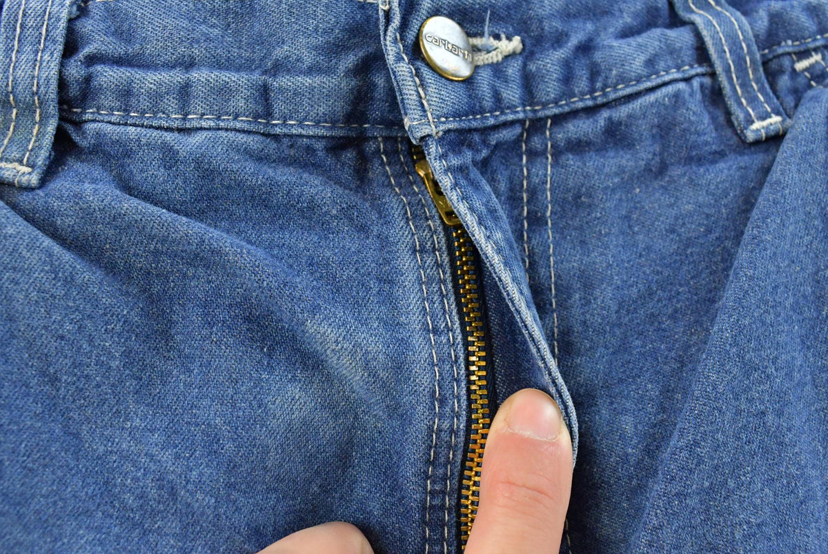 Vintage 2000s Carhartt Denim Blue Jeans Men's 28 x 28.5 from propervintagecanada