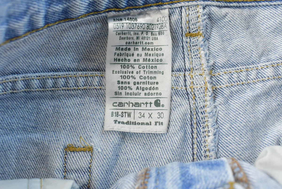 Vintage 2000s Carhartt Denim Blue Jeans Men's 33 x 29.5 from propervintagecanada