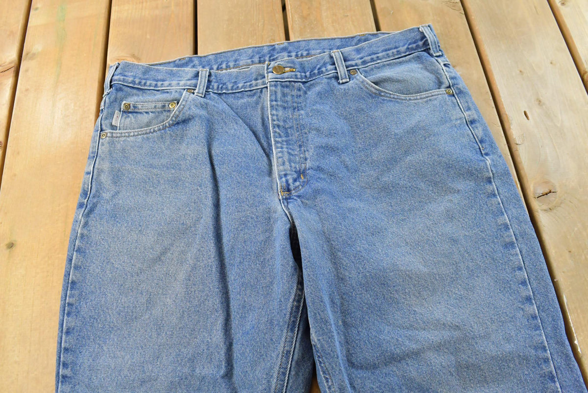 Vintage 2000s Carhartt Denim Blue Jeans Men's 38 x 25 from propervintagecanada