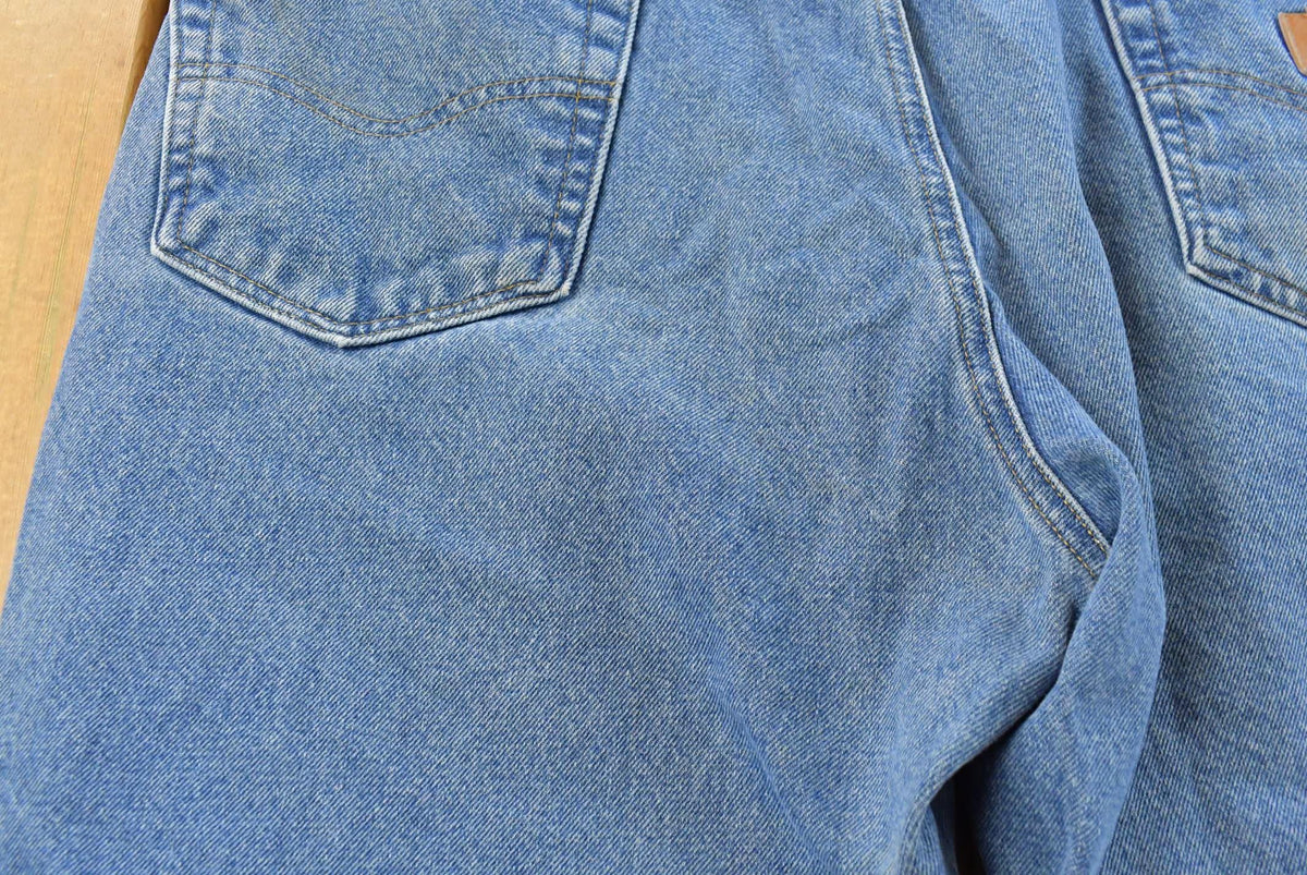 Vintage 2000s Carhartt Denim Blue Jeans Men's 38 x 25 from propervintagecanada