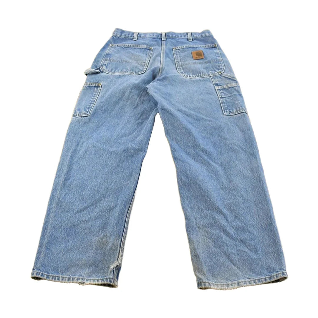Vintage 2000s Carhartt Distressed Double Knee Denim Work Jeans Men's 31 x 29 from propervintagecanada
