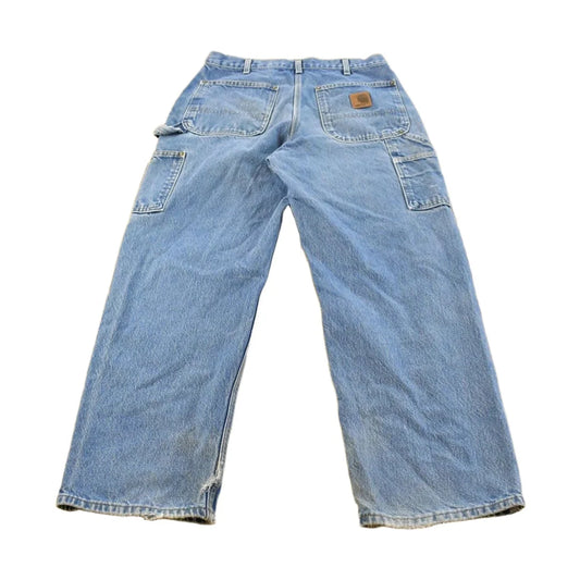 Vintage 2000s Carhartt Distressed Double Knee Denim Work Jeans Men's 31 x 29 from propervintagecanada