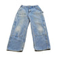 Vintage 2000s Carhartt Distressed Double Knee Denim Work Jeans Men's 31 x 29 from propervintagecanada