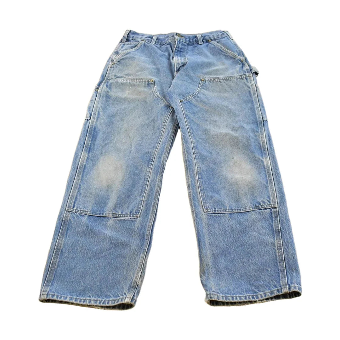 Vintage 2000s Carhartt Distressed Double Knee Denim Work Jeans Men's 31 x 29 from propervintagecanada