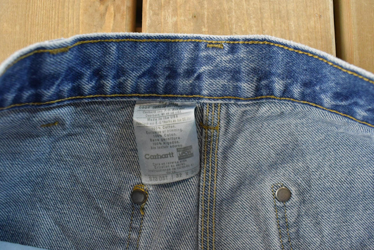 Vintage 2000s Carhartt Distressed Double Knee Denim Work Jeans Men's 31 x 29 from propervintagecanada