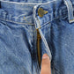 Vintage 2000s Carhartt Distressed Double Knee Denim Work Jeans Men's 31 x 29 from propervintagecanada
