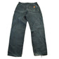 Vintage 2000s Carhartt Distressed Double Knee Denim Work Jeans Men's Medium 33 x 32 from propervintagecanada
