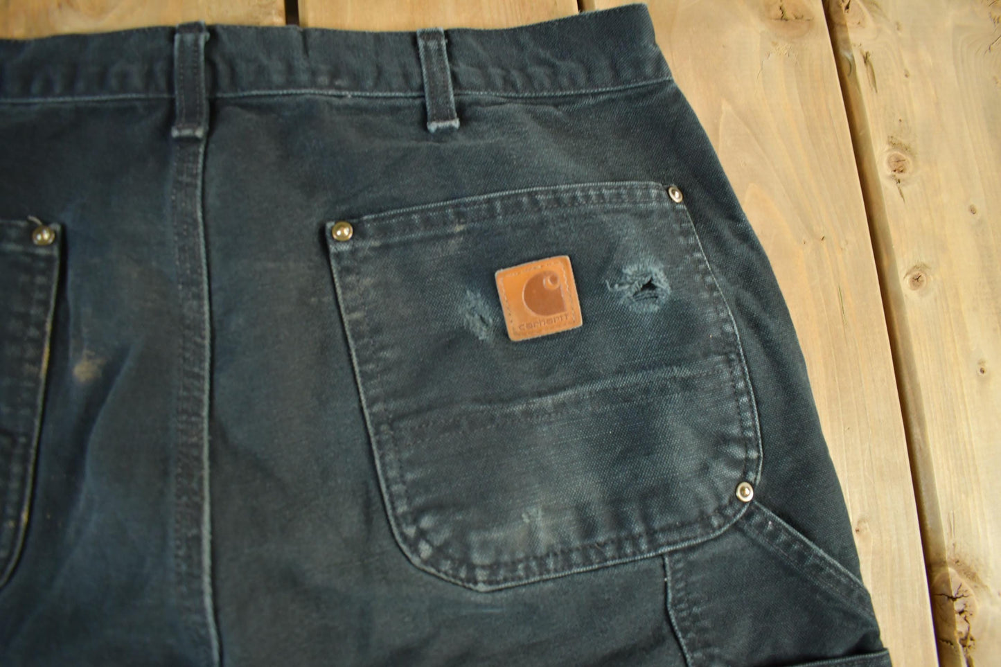 Vintage 2000s Carhartt Distressed Double Knee Denim Work Jeans Men's Medium 33 x 32 from propervintagecanada